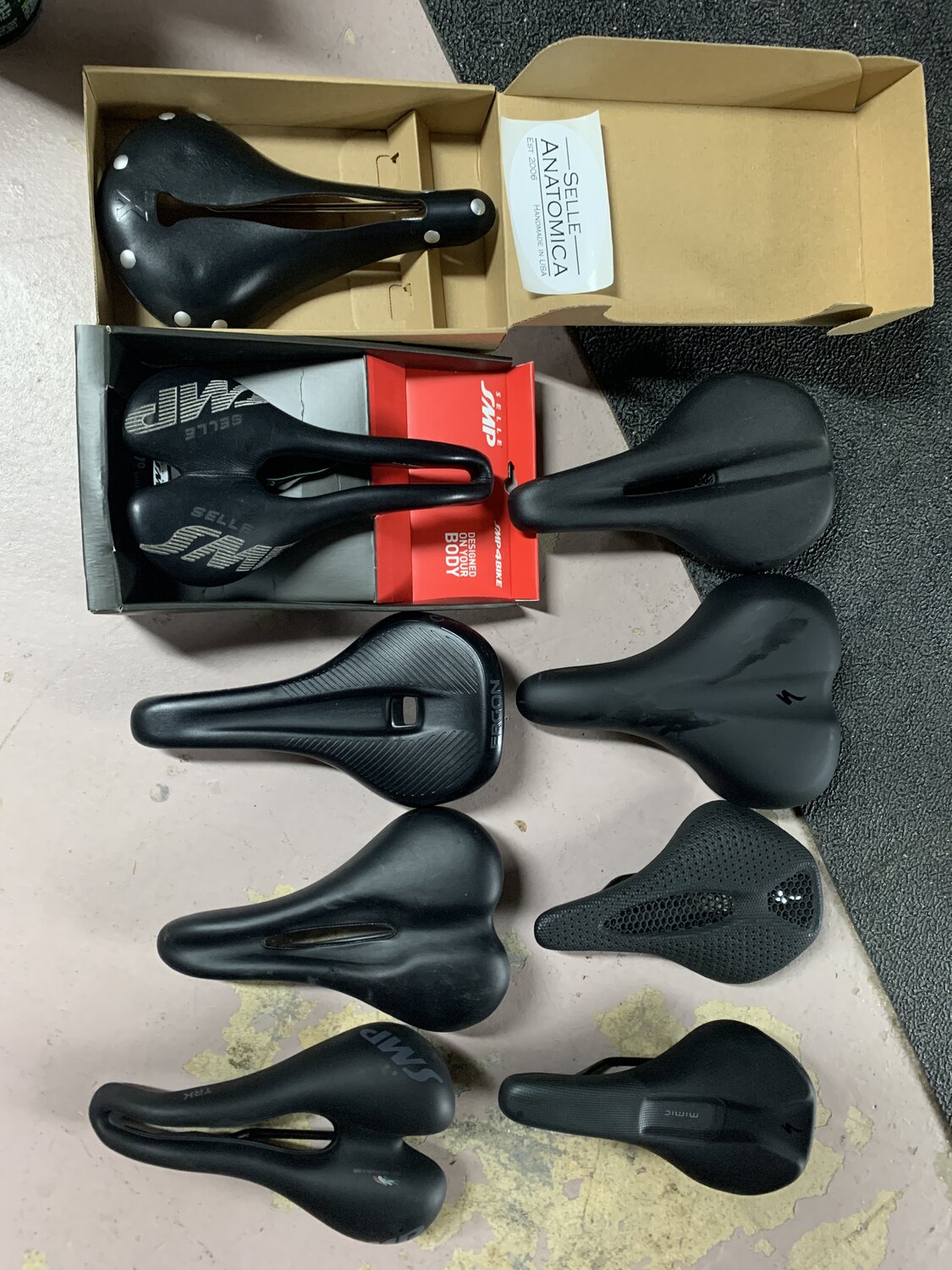 10 different bike saddles.JPG