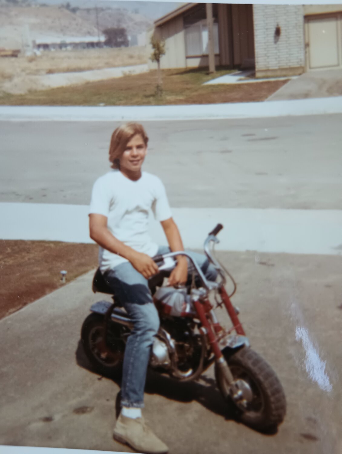 14 yo  me on a Honda.jpg