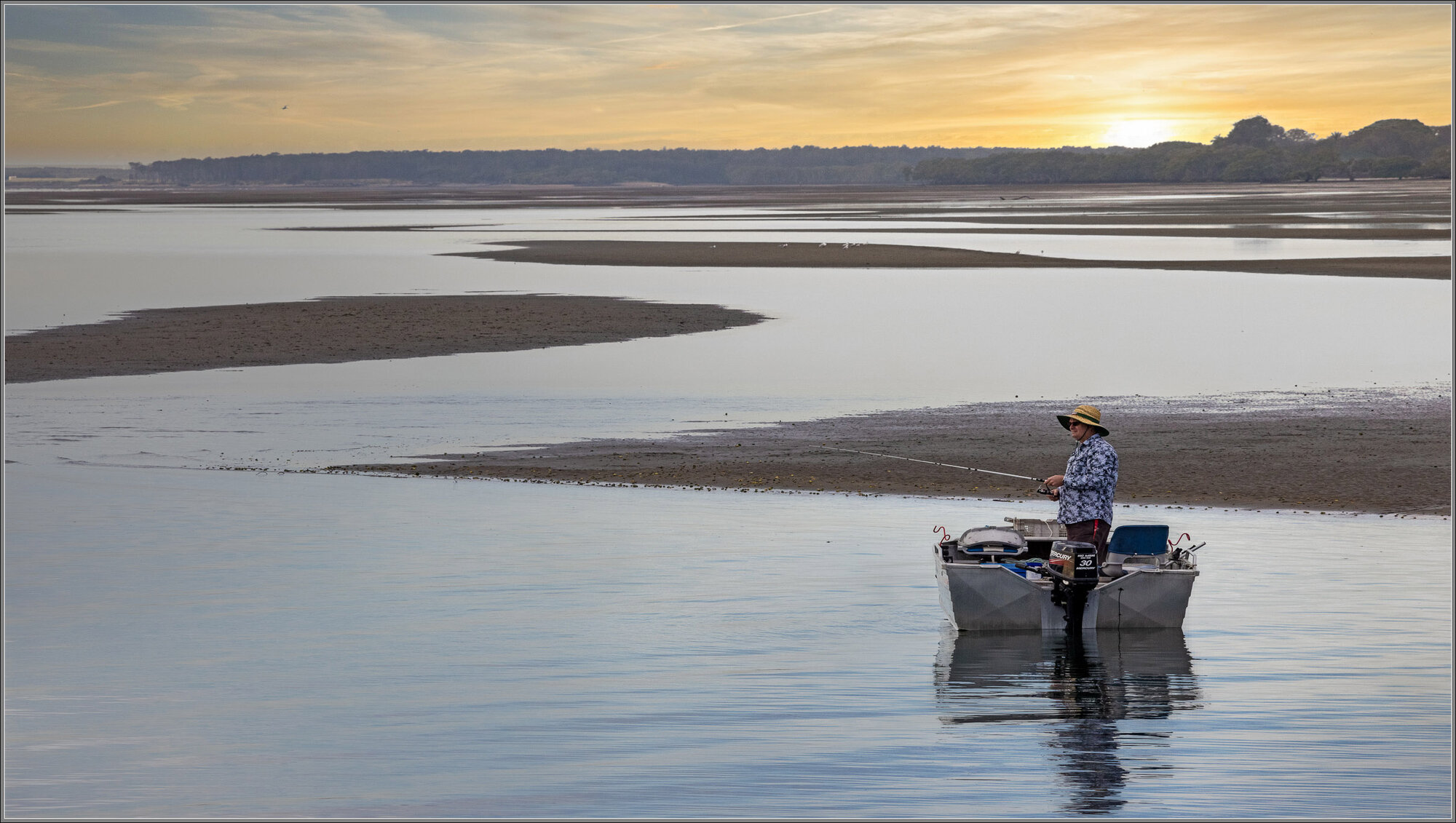 Fishing beside the Moreton Bay Cycleway