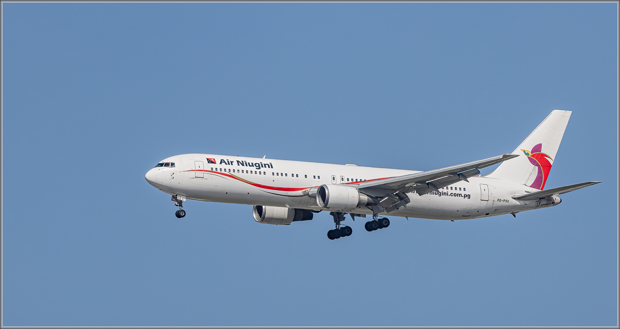Air Niugini Boeing 767 : P2-PXV approaching Brisbane Airport : BNE