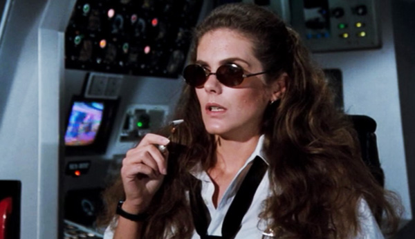 airplane-ii-the-sequel-elaine-smokes-weed-joint-roach-julie-hagerty-review.jpg