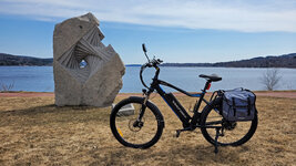 ebike-by-stone-sculpture.jpg