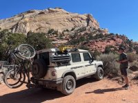 Grandier with two bikes in the desert.jpg