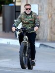 arnold-schwarzenegger-on-an-electric-bike-felt-outfitter.jpg