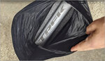 2nd battery stored in tailfin trunk bag.jpg